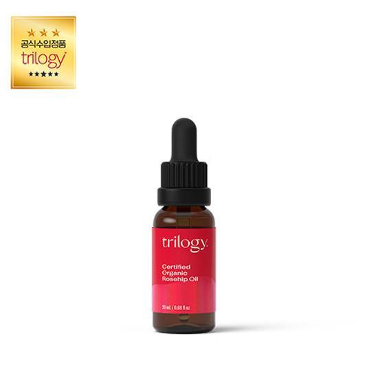 Trilogy Certified Organic 100% Rosehip Oil bottle, ideal for skincare, featuring a sleek design and vibrant labeling, representing K-Beauty and personal care cosmetics.