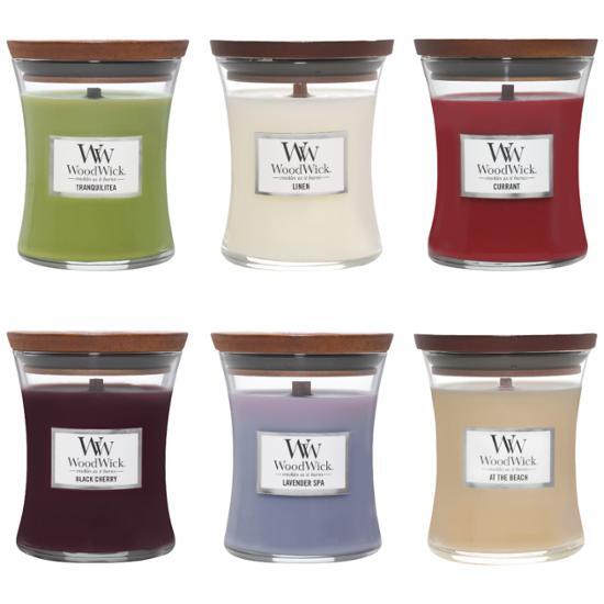 Woodwick Medium Candle 275g available in six delightful scents, perfect for enhancing ambiance and fragrance in any space.