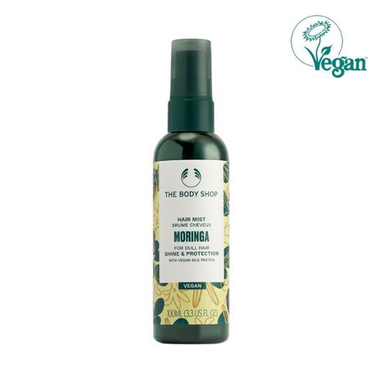 100ml vegan Moringa Hair Mist from The Body Shop, designed for nourishing hair care, featuring a refreshing floral scent.