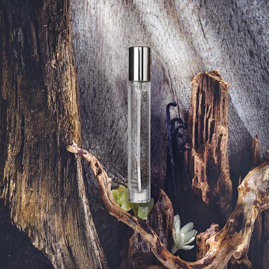 NCP 601 Amber & Guaiac Wood EDP 10ml Gift Set with perfume pouch and bonus 1ml sample, showcasing a luxurious fragrance experience.