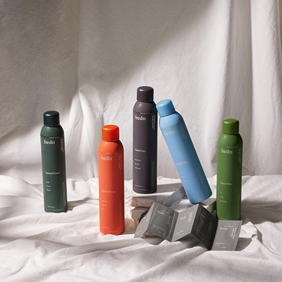 Hidden Perfume Spray Body Lotion - Santal Gray Plan, a luxurious man's beauty product in a sleek bottle, designed for body cleansing and hydration.