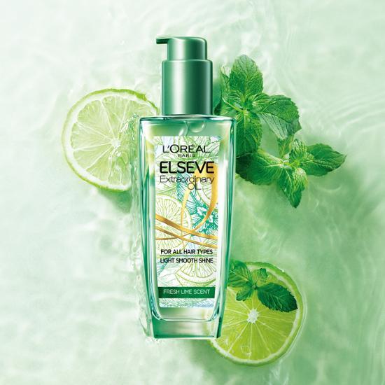 100ml bottle of L'Oreal Paris Hair Oil Mojito, a revitalizing hair care treatment from the K-Beauty range, designed to nourish and enhance hair health.