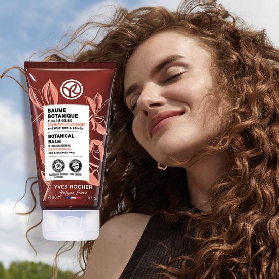 Yves Rocher Jojoba Universal Botanical Balm 150ml for severely damaged hair, nourishing hair care treatment in a sleek container.
