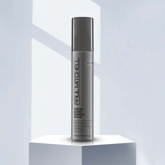 Paul Mitchell Forever Blonde Dramatic Repair 150ml for men's beauty, designed to enhance and repair blonde hair, featured in a sleek bottle.
