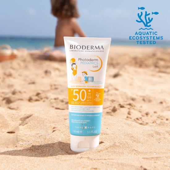 100ml bottle of Bioderma Photoderm Pediatric SPF 50+ sunscreen, designed for children's skin protection, featuring a vibrant packaging suitable for sun care.