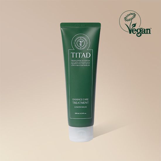 Alt text: TITAD Lemon Balm Damage Care Treatment 200ml - K-Beauty hair care product designed to repair and nourish damaged hair.