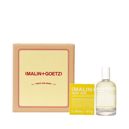 Malin + Goetz Holiday Dark Rum Perfume and Candle Set featuring a 50ml Dark Rum Eau de Parfum and a 67g Dark Rum Candle, perfect for gifting or personal indulgence.