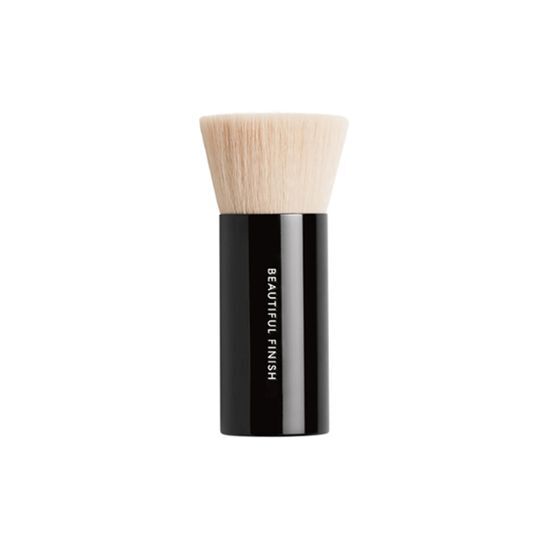 Close-up of the BareMinerals Beautiful Finish Brush, a sleek beauty tool designed for flawless makeup application, perfect for K-Beauty enthusiasts.