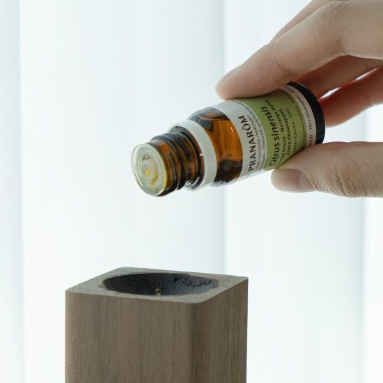 Pranarom Sweet Orange Oil 10ml bottle, a skincare product ideal for toners and mists, featuring vibrant orange packaging showcasing its fruity essence.