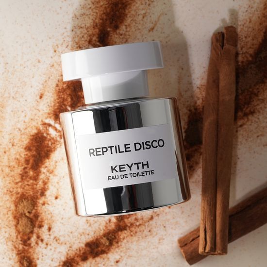 Alt text: Kiss Eau de Toilette 50ml Reptile Disco, a vibrant K-Beauty fragrance showcasing a unique reptile-inspired design, perfect for personal care and cosmetics lovers.