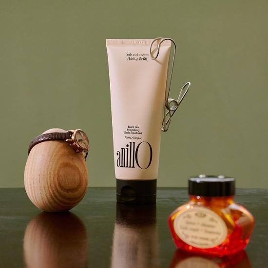 Anilo Black Tea Nourishing Scalp Treatment 150ml - K-Beauty hair care product for revitalizing and nourishing the scalp.