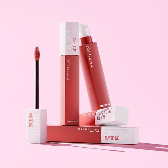 Alt text: Maybelline New York Superstay Lip Ink in shade 220 Ambitious, featuring a long-lasting liquid formula, displayed with nine vibrant color options.