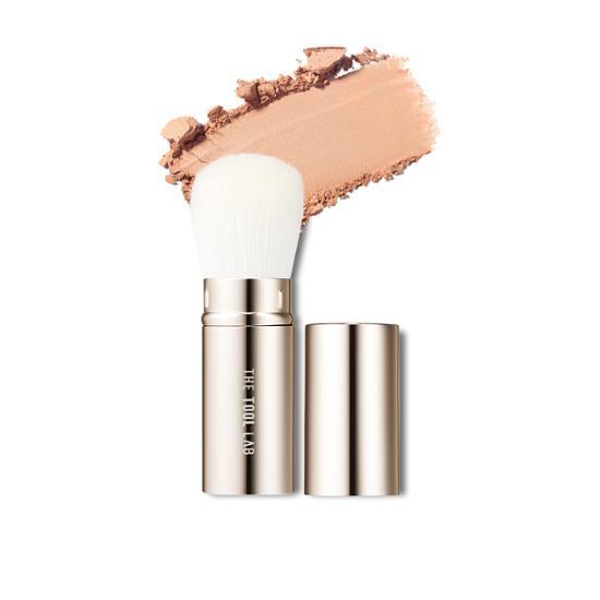 Retractable portable powder blush and contour brush from The Tool Lab, perfect for K-Beauty makeup application.