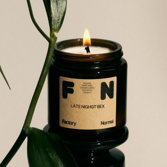 Factory Normal Brown Bottle Soy Candle 105g in Shea Butter scent, offering a soothing fragrance experience for personal care.