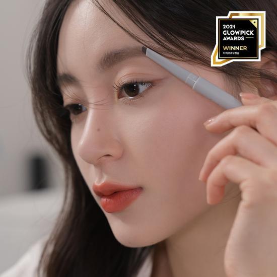 Romand Hanol Flat Brow in C2 Gray - Single item showcasing a sleek and stylish eyebrow product.