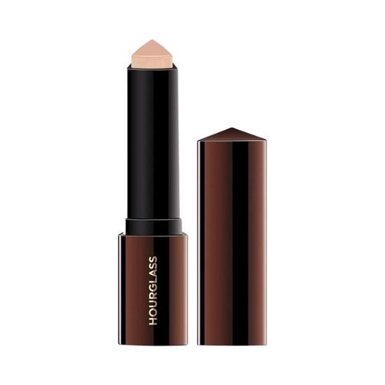 Hourglass Vanish Foundation Stick in Shell shade, offering a seamless finish for a flawless complexion.