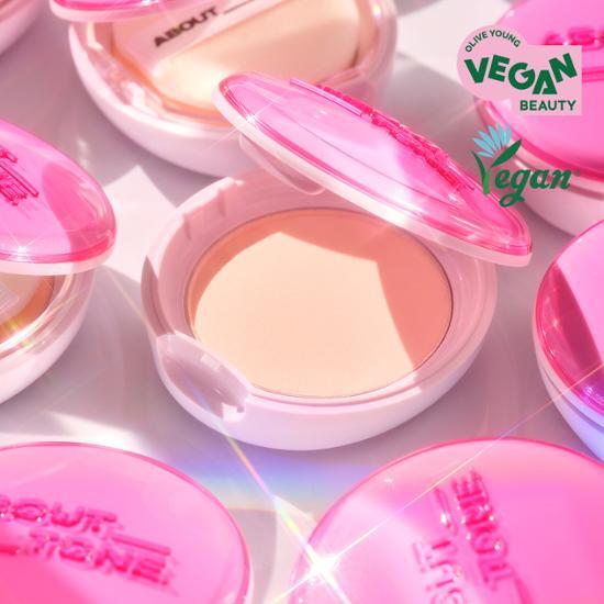 About Tone Glow Powder Pact showcasing a compact powder with a luminous finish, ideal for achieving a radiant complexion.