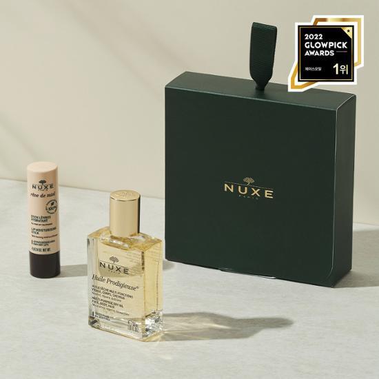 Nuxe Bestsellers Gift Set featuring 30ml Dry Oil and 4g Reve de Miel Lip Balm, perfect for skincare enthusiasts.