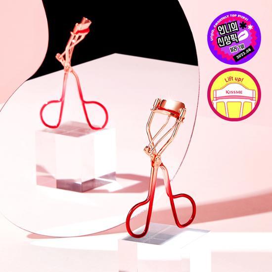 One-handed eyelash curler from Kiss Me, designed for effortless beauty, featuring a sleek handle and perfect for enhancing eyelashes in the K-Beauty routine.