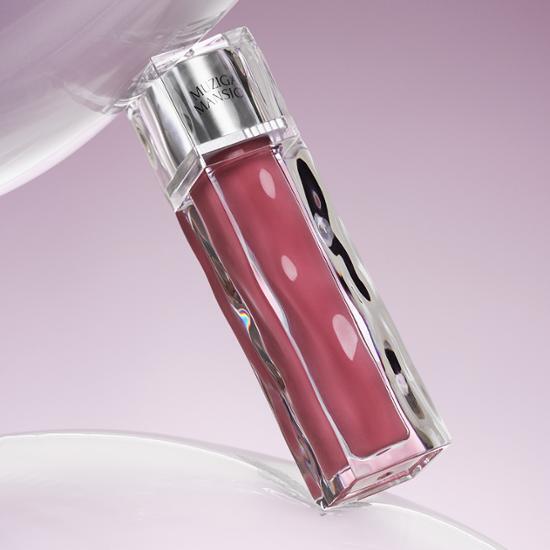 Alt text: Rainbow Mansion Icy Glow Tint in shade 01 Petal, featuring a soft pink hue in a sleek tube, perfect for adding a radiant touch to your makeup.