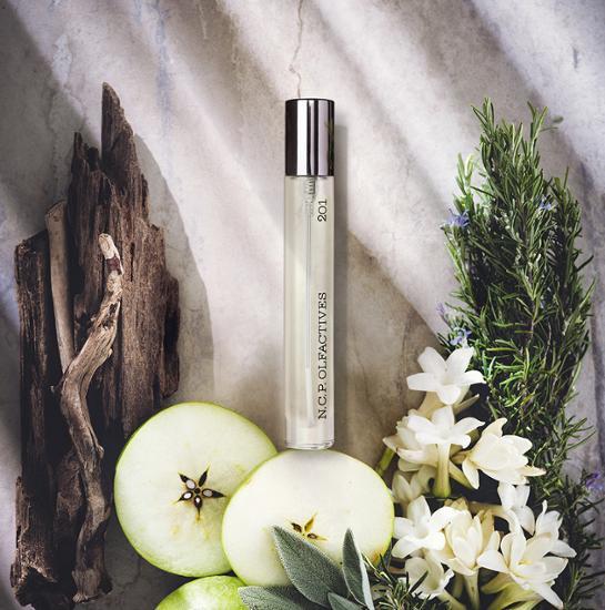 NSP 201 Apple & Driftwood EDP 10ml Gift Set with perfume pouch and 1ml sample, showcasing a stylish fragrance for K-Beauty enthusiasts.