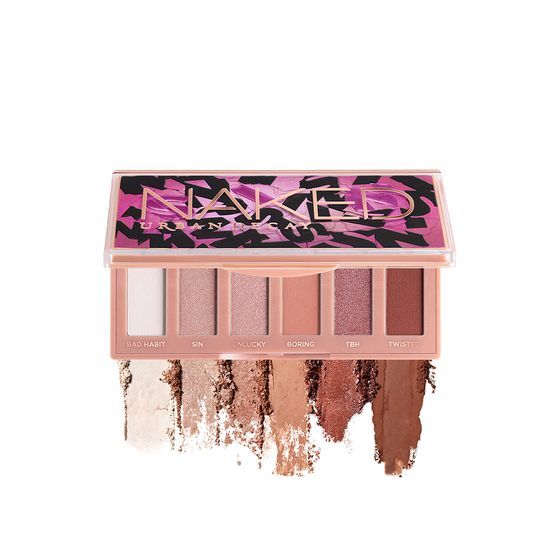 Urban Decay Naked Mini Eyeshadow Palette in Half Baked variant, featuring a compact design with a selection of versatile shades for creating stunning eye looks.