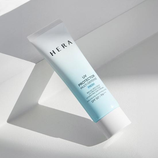 50ml bottle of Hera UV Protector Multi Defense Fresh SPF 50+ PA++++, a K-Beauty skincare product for sun protection.