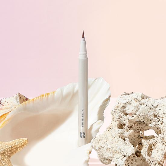 Holika Holika Glitz Eyeliner in shade 01 Naked Shell, featuring a sleek design and shimmering finish for a perfect eye makeup look.