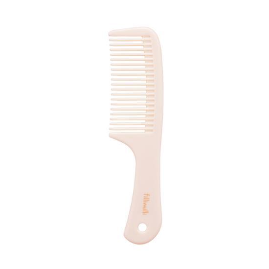 Close-up of PiliMili Mini Hair Comb, a sleek beauty tool designed for effortless styling, perfect for K-Beauty enthusiasts.