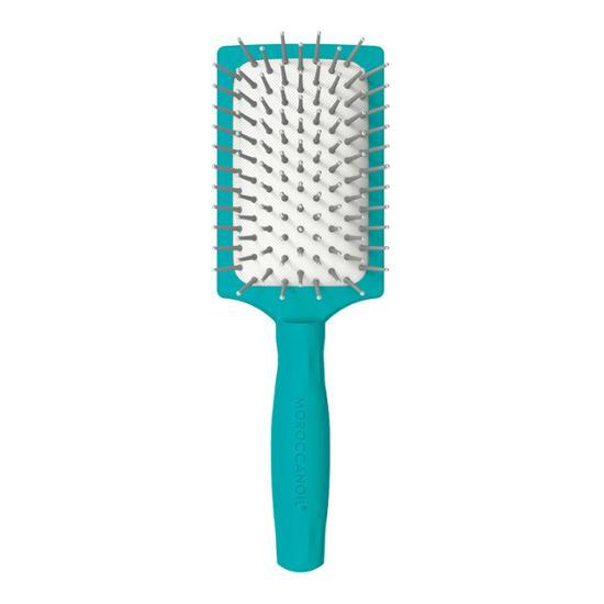 Moroccan Oil Mini Paddle Brush - a sleek beauty tool designed for smooth styling and detangling, perfect for all hair types.