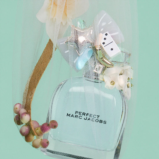 Marc Jacobs Perfect Eau de Toilette 50ml fragrance bottle with floral design, representing K-Beauty and personal care.
