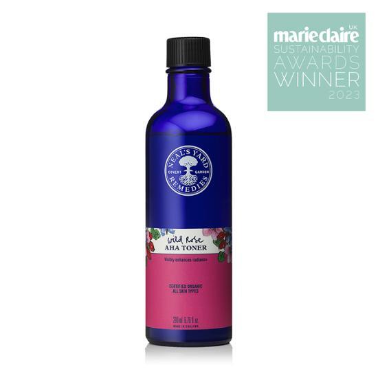 200ml bottle of Nils Yard Remedies Wild Rose AHA Toner, a skincare product designed to refresh and enhance skin, featuring natural ingredients for a radiant complexion.