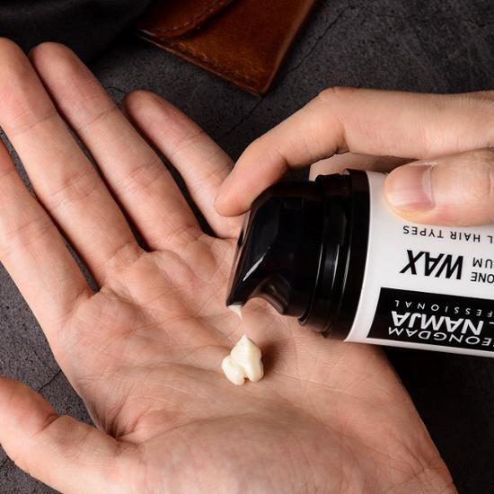 Cheongdam Man All-in-One Premium Hair Wax & Pomade 55g for men's styling, featuring a sleek container designed for versatile hair looks in K-Beauty.