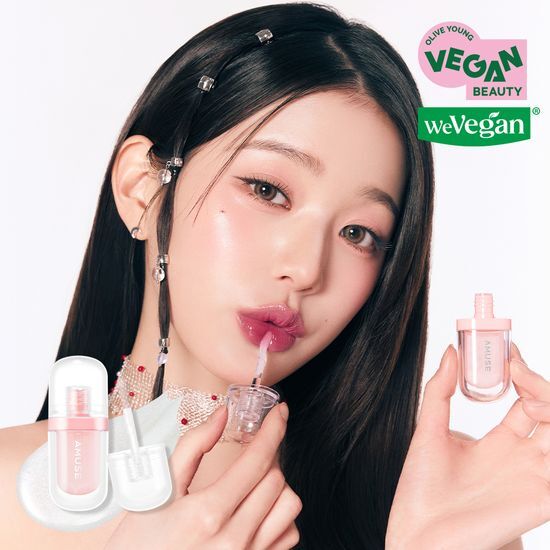 Alt text: Amuse Lip Plumper in Big Diamond shade, enhancing lips with a glossy finish, featuring a stylish packaging design.