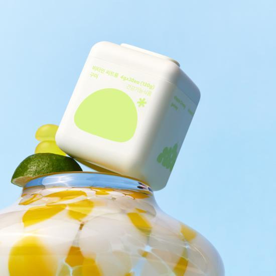 Slow Glow Vitamin C Lemon Gummies bottle with 30 gummies, offering a 15-day supply for skin health and radiance.