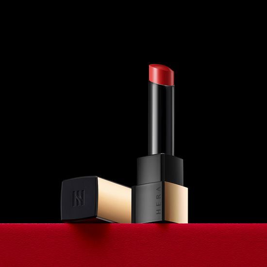 Alt text: Hera Rouge Clash 3.5g lipstick in Cliché shade, showcasing a sleek design and vibrant color, perfect for enhancing your makeup collection.