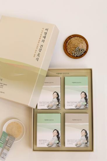 Lee Young-ae's Healthy Gourmet Enzyme Gift Set with 4 pieces, including 2 Vitality and 2 Sprout enzymes, beautifully packaged.