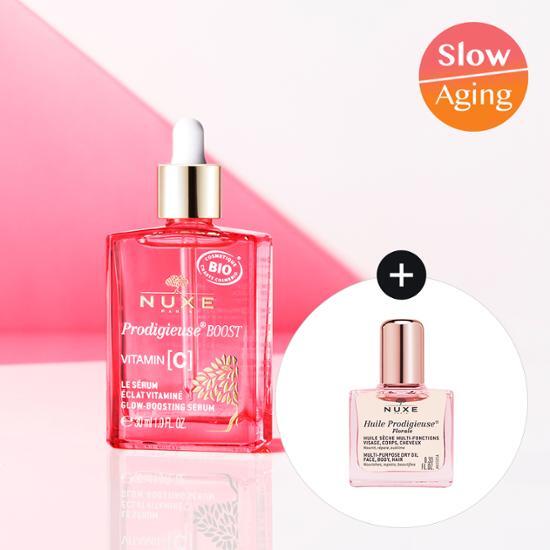 30ml Nuxe Prodigieuse Boost Glow Boosting Serum set with a free 10ml floral oil, showcasing skincare essentials for a radiant complexion.