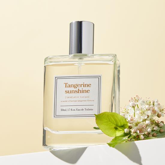 50ml bottle of Aro Tangerine Sunshine EDT fragrance, showcasing a fresh and vibrant citrus scent, ideal for K-Beauty enthusiasts.