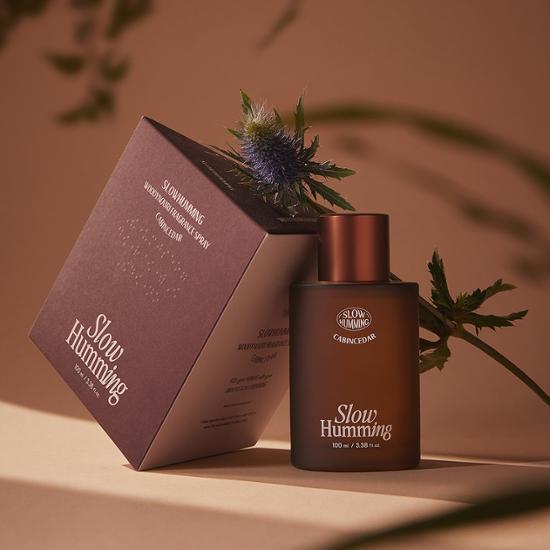 Slow Humming Woody Nary Fragrance Spray 100ml - Cabin Cedar, a soothing and earthy scent in a sleek bottle, perfect for enhancing your personal care routine.