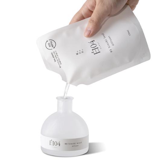 Pure White Hinoki Diffuser 150ml Refill in Leaf scent, featuring reed sticks, designed for a refreshing fragrance experience.