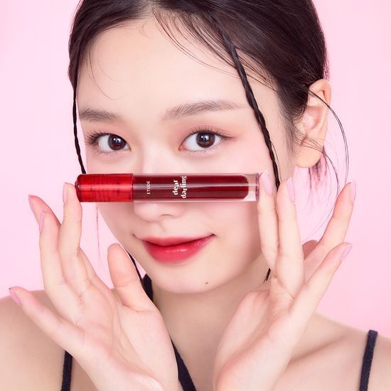 Etude Dear Darling Water Gel Tint in shade 09 Milk Strawberry, showcasing a vibrant pink hue for a fresh and fruity lip look.