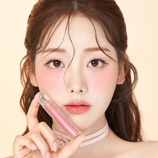 Alt text: MouMou Pro Pairing Tint 4g in Peach Fuzz, showcasing a lustrous shine finish, part of a collection with 6 colors including 3 matte and 3 shimmering options.