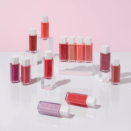 Alt text: Inga Water Glow Lip Tint 4.5g in Color 13_Bear Peach, a warm-toned lip product with a smooth finish.