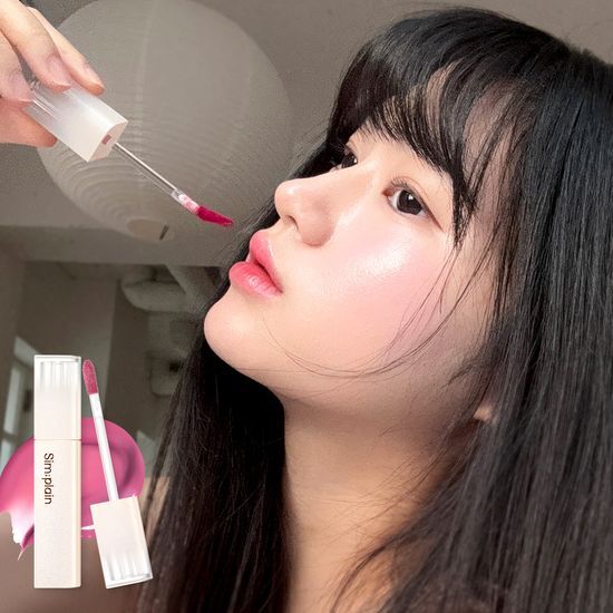 Simple Rain Dewy Volume Tint in shade 08 Presso Plum, showcasing a rich plum color in a sleek packaging, perfect for a natural and vibrant lip look.