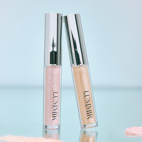 2g Lumiere On The Stage Liquid Glitter in 7AM Yellow Beryl, featuring shimmering yellow hues for vibrant makeup looks.