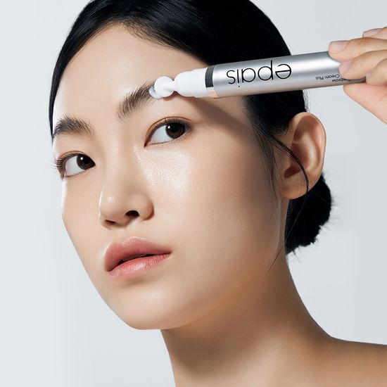 15ml tube of A'pieu Ape Eyebrow Rich Cream Plus, an outer eyebrow nourishing treatment, showcasing its sleek packaging.