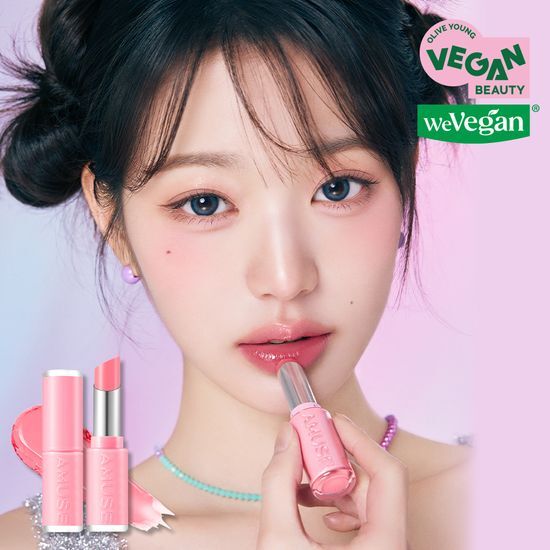 Amuse Fondue Balm in Toasty Rose - Moisturizing lip balm available in 10 varieties, featuring a soft pink hue.