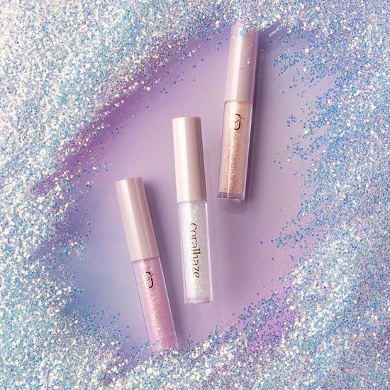 Coral Haze Stardust Glitter in Comet - a shimmering, multi-colored glitter mix featuring vibrant coral hues, perfect for crafts and cosmetic applications.