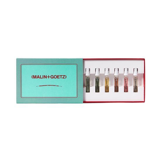 Malin + Goetz Holiday Fragrance Discovery Kit featuring six 2ml fragrance vials, perfect for exploring a variety of scents in a stylish package.